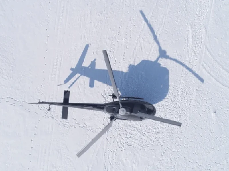 helicopter resting on base camp everest