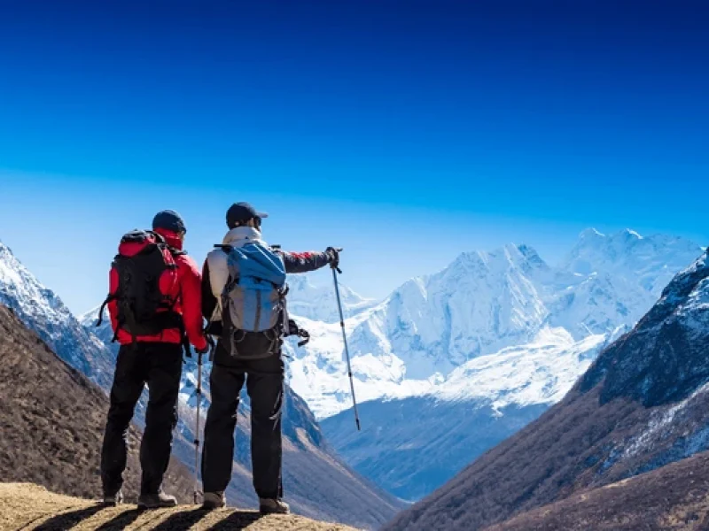 hikers enjoying himalayan view while trekking in nepal